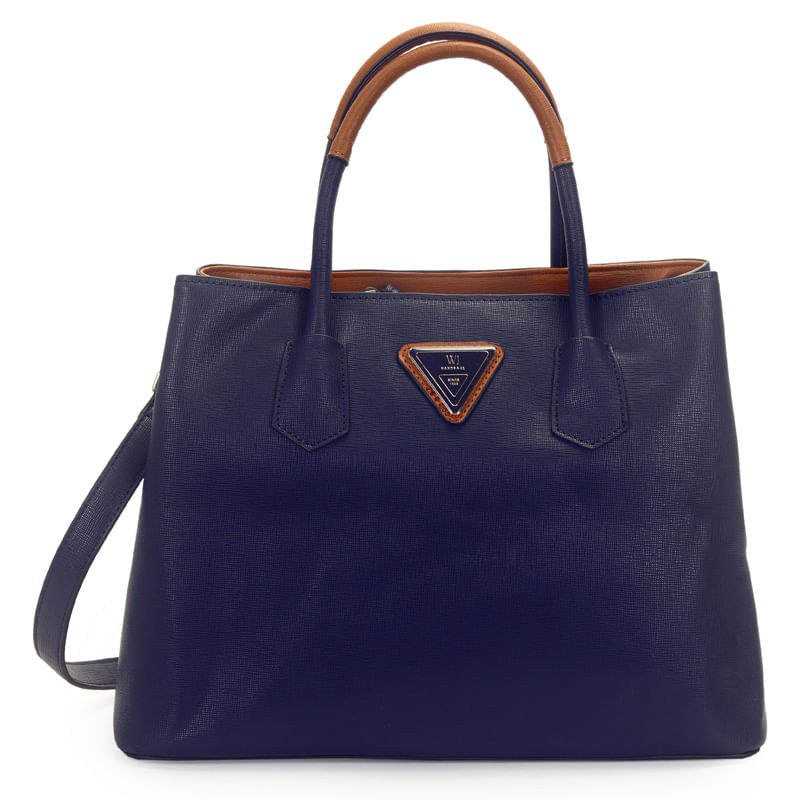 Bolsa casual feminina azul marinho com alças caramelo, formato retangular e detalhe frontal triangular da marca WJ